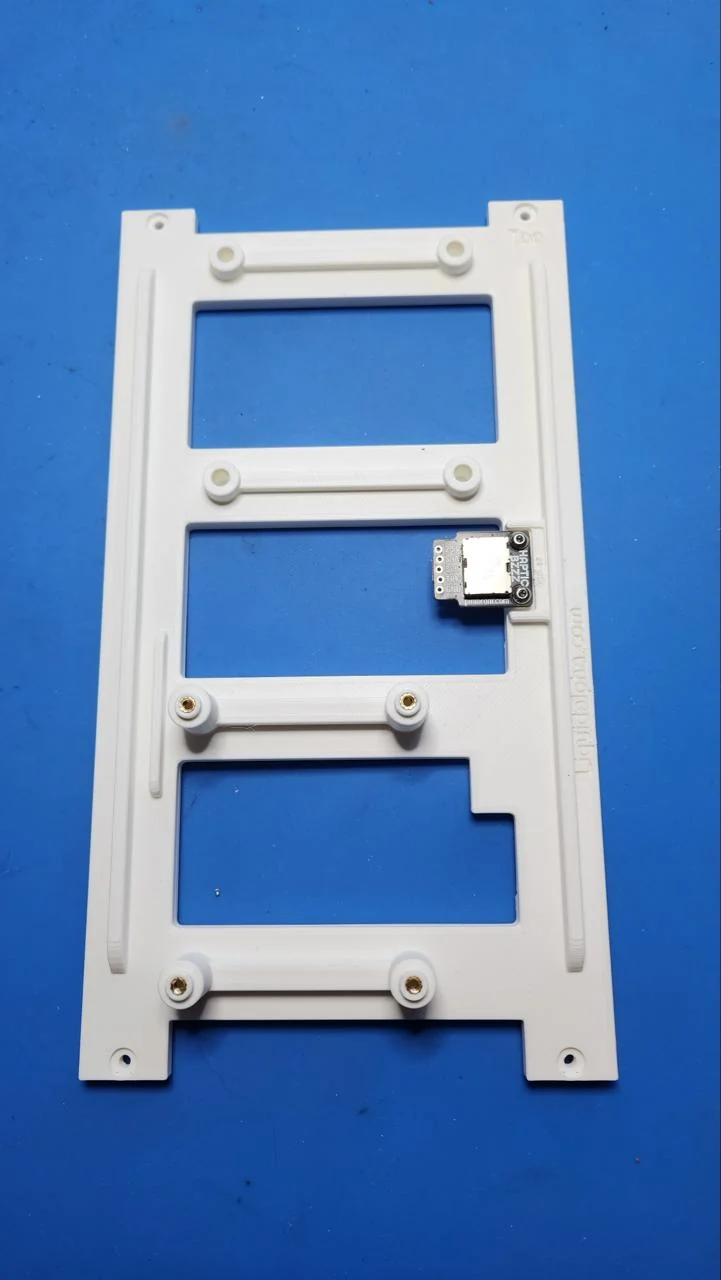 White 3D printed experimental structure with a haptic actuator module