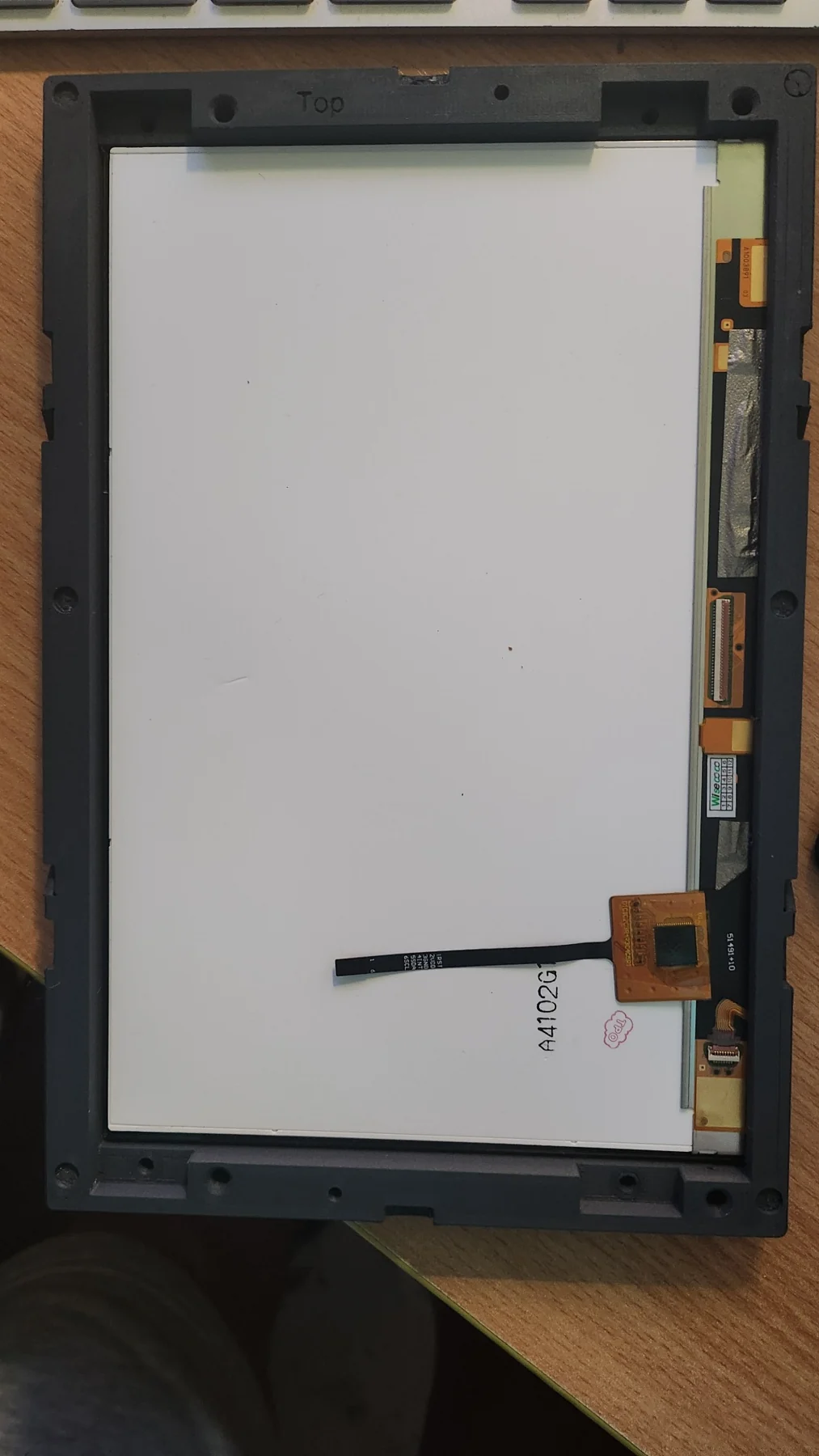 Rear of LCD panel closely fitted inside its custom enclosure