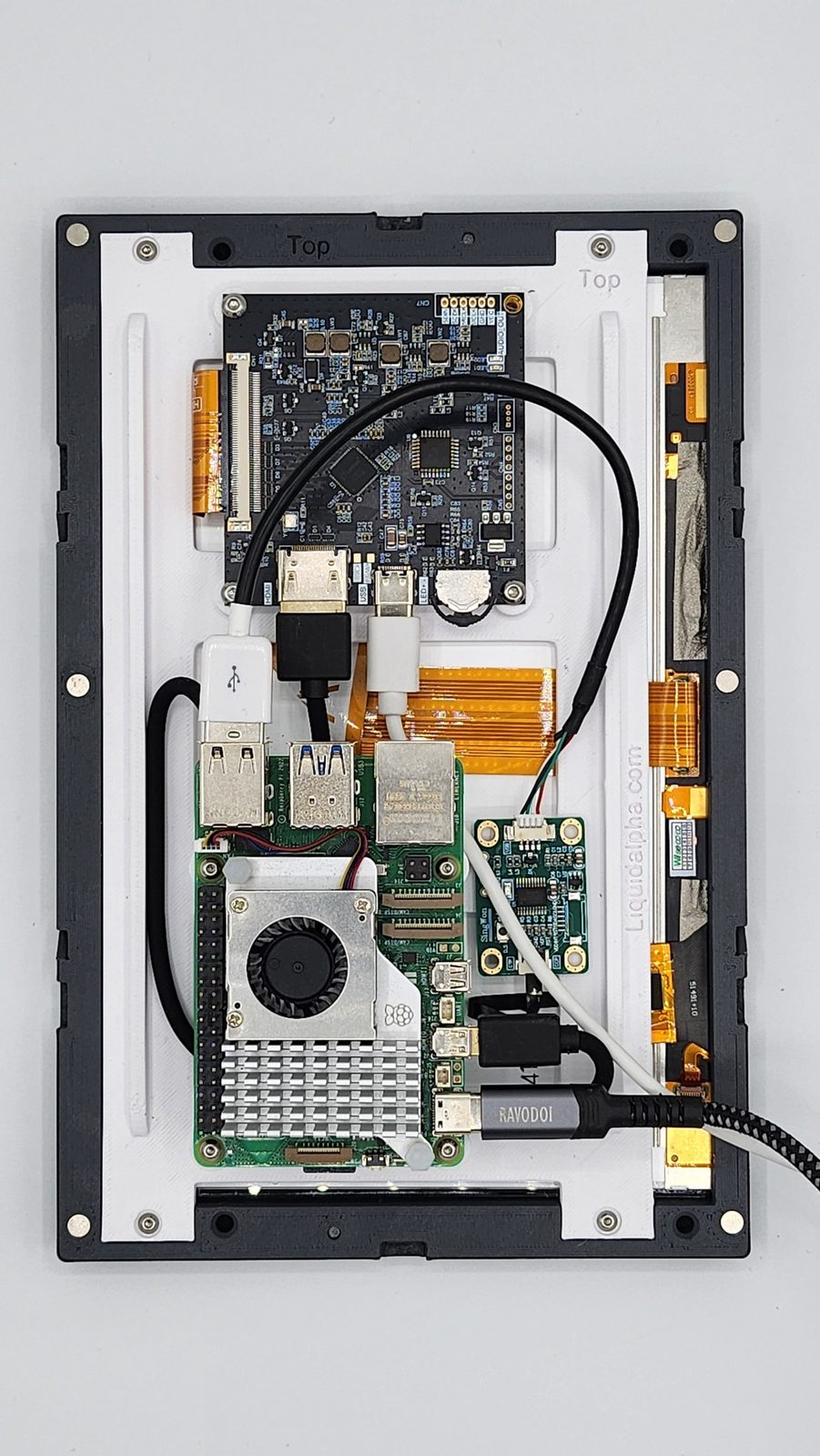 Internal prototype assembly showing screen controller, Pi and interface electronics.