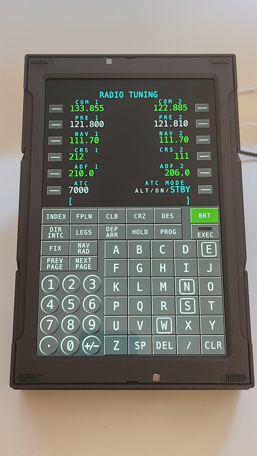 LAS TFMC prototype running a 737-style radio tuning page.